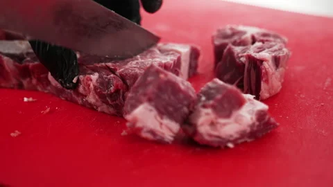 Meat cut into cubes Video stock 168863787