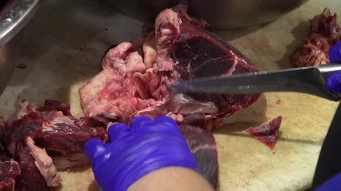 Meat is cut with a knife Stock Footage 297194035