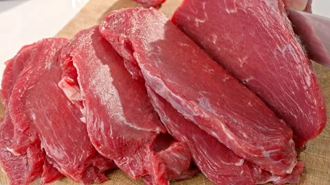 Meat is cut into pieces. Stock Footage 311589295