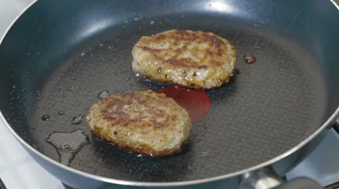 Meat cutlets are fried in pan Video stock 59761392
