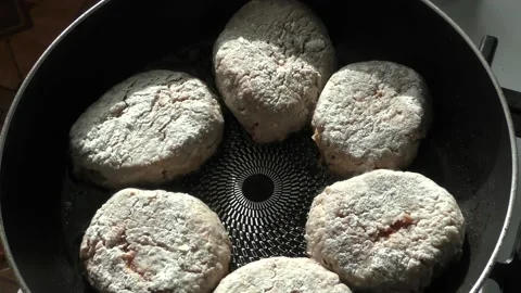 Meat cutlets are fried in a pan Stock Footage 165890591