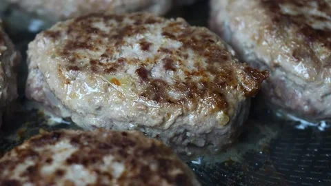 Meat cutlets are fried in a pan Stock Footage 170217406