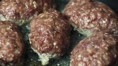 Meat cutlets are fried in a pan Stock Footage 170217420