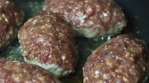 Meat cutlets are fried in a pan Stock Footage 170217435