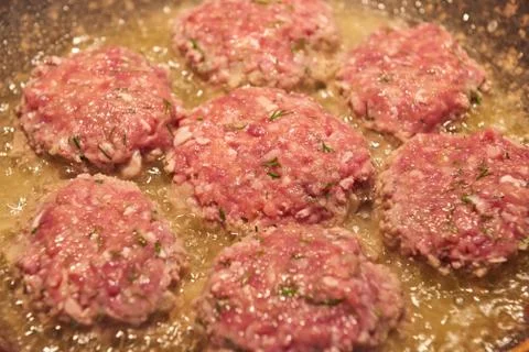 Meat cutlets are fried Stock Photos