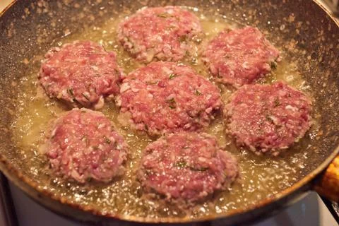 Meat cutlets are fried Stock Photos