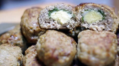 Meat cutlets with eggs and greens Stock Footage 66555013