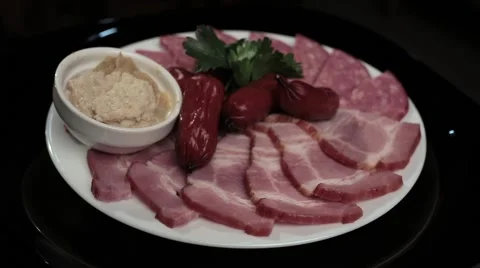 Meat cutter on a plate Video stock 53315848
