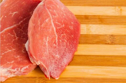 Meat on a cutting board 3 Stock Photos