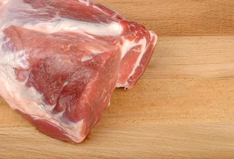 Meat on a cutting board Stock Photos