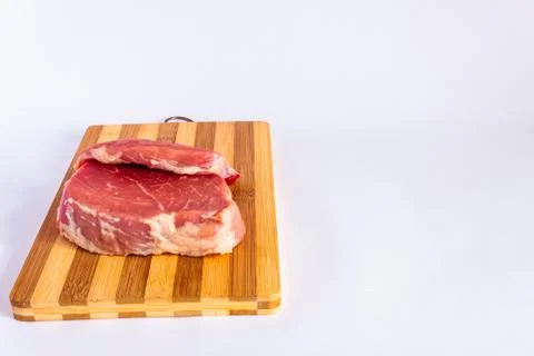 Meat on a cutting board Stock Photos