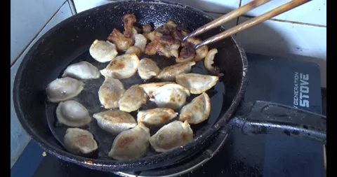 Meat cutting, meat roasting Stock Footage 309002383