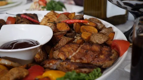 Meat cutting on the table in restaurant Stock Footage 122560020
