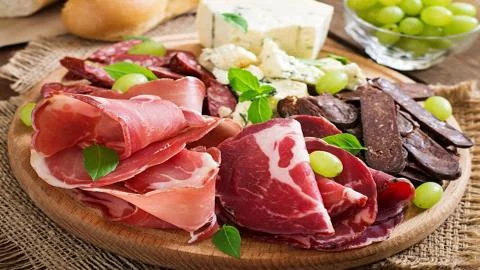 Meat delicacies Stock Photos