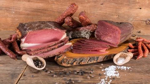 Meat delicacies Stock Photos