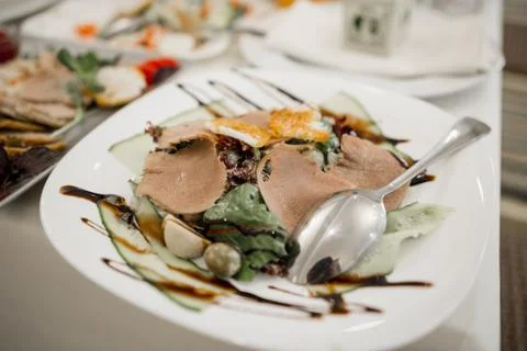 Meat dish on a table in a restaurant Stock Photos