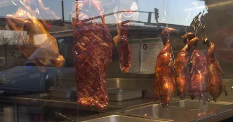 Meat on display in a butcher shop window Stock Footage 84513450