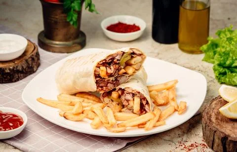 Meat doner in lavash on the table Stock Photos