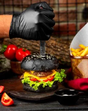 Meat double cheeseburger in brown bread Stock Photos