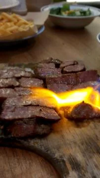 Meat on fire Stock Photos