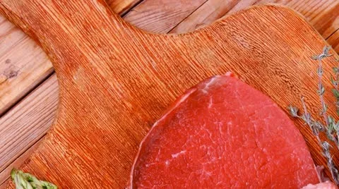Meat food : raw beef fillet on cutting board Stock Footage
