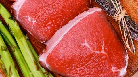 Meat food : raw beef fillet on cutting board Stock Footage