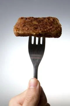 Meat on fork Stock Photos