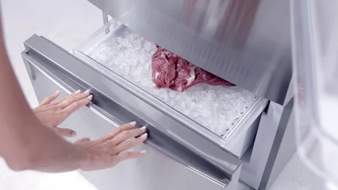 Meat in freezer in slow motion Video stock 73390652