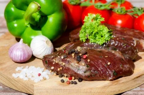 Meat with fresh vegetables. Stock Photos