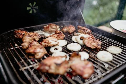 Meat is fried on a barbeque Stock Photos
