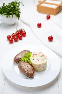 Meat fried cutlets with mashed potatoes and salad Stock Photos