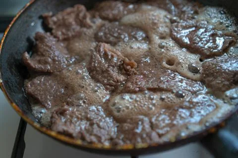 The meat is fried on fire Stock Photos