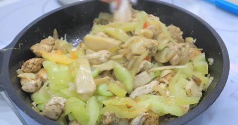 Meat fried in a frying pan Video stock 145889360