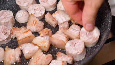 Meat is fried in a frying pan Stock Footage 255399006