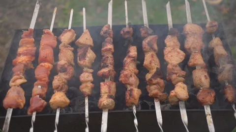 Meat is fried on the grill Stock Footage 96558931