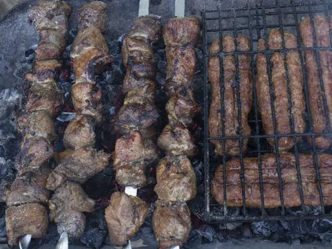 Meat fried on the grill. Stock Photos