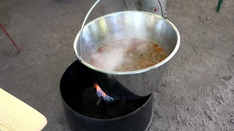 Meat fried in a huge cauldron. 4K Stock-Footage 54923065