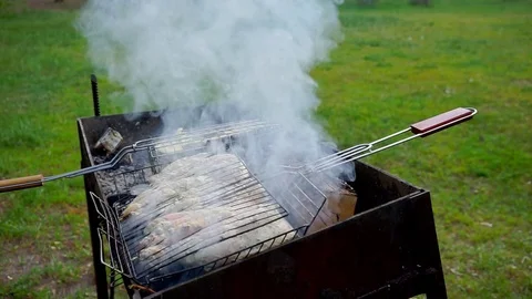 Meat is fried in Mangal Stock Footage 75798396