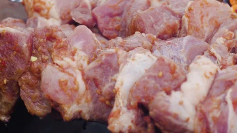 Meat is fried on an open fire Stock Footage 128462365