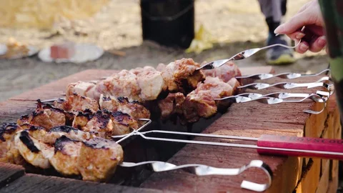 Meat is fried on an open fire Stock Footage 128462407