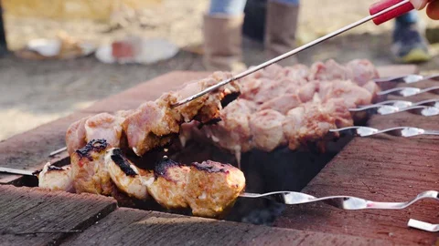 Meat is fried on an open fire Stock Footage