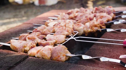 Meat is fried on an open fire Stock Footage 128462476