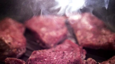 Meat is fried in a pan. Stock Footage 129290236