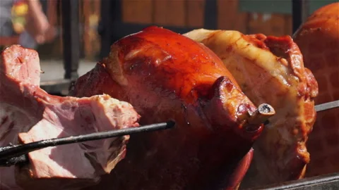 Meat fried on a rotating grill. Stock Footage 106111271