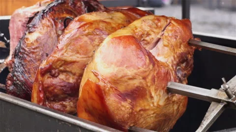 Meat fried on a rotating grill. Stock Footage 106111338