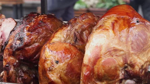 Meat fried on a rotating grill. Stock Footage 106111366