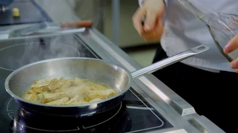 Meat fried in a skillet Stock Footage 70980594