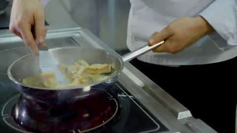 Meat fried in a skillet Stock Footage 70980973