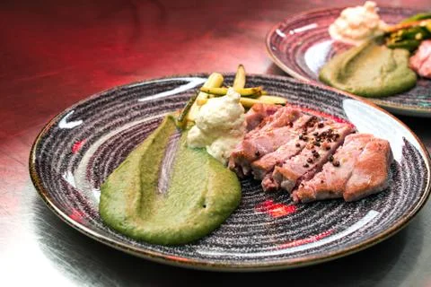 Meat with fruit sauce Stock Photos