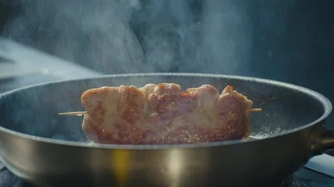 Meat Frying on a Pan, Pork Battered Meat on the Pan, Close Up Stock Footage 196257067